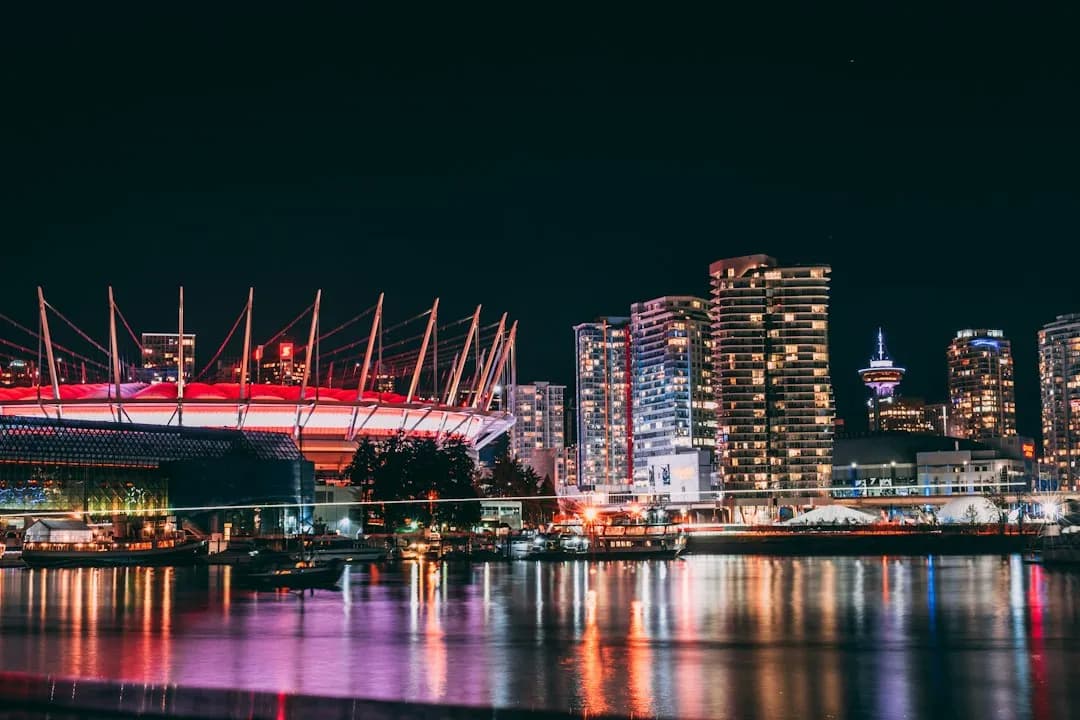 Vancouver and BC Place lights reflected in the water